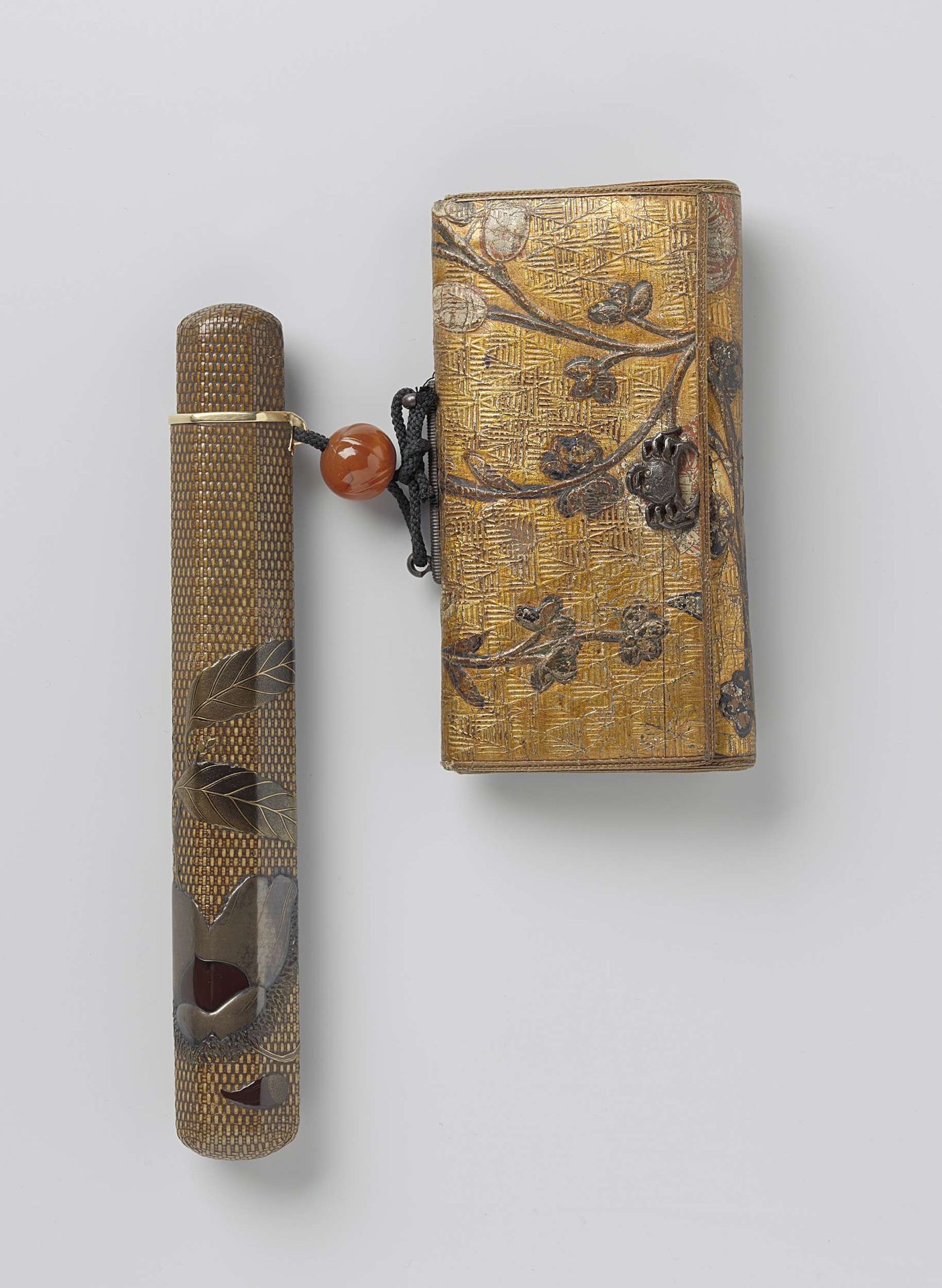 Pipe case with chestnuts and gilt leather tobacco pouch by Tsuzuki Kosai