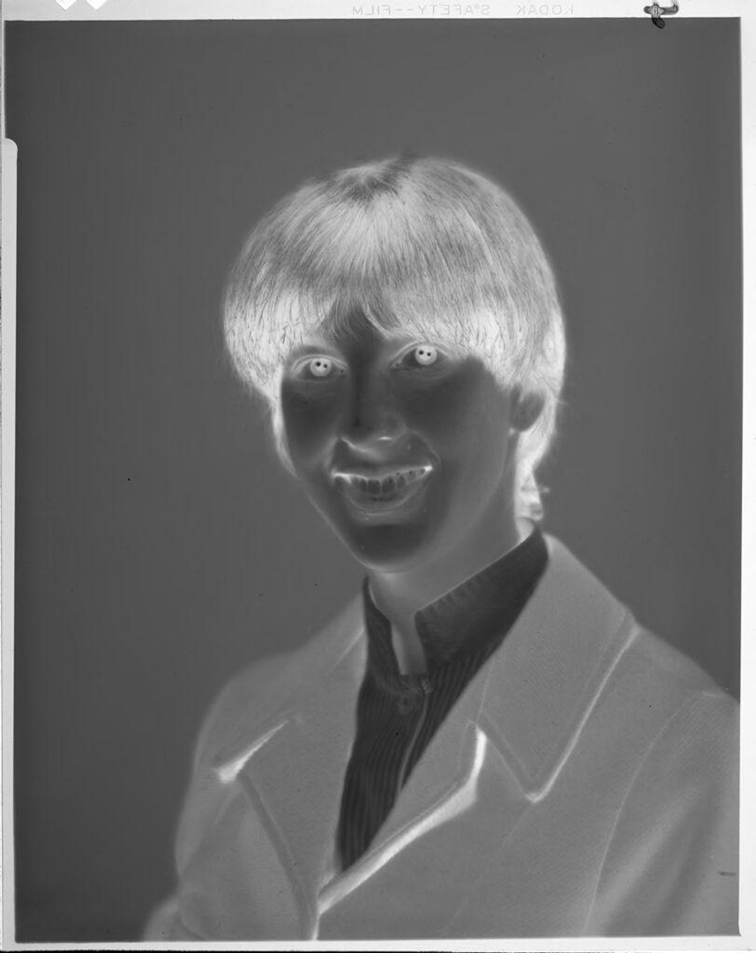 Untitled (portrait of young man) by John Howell