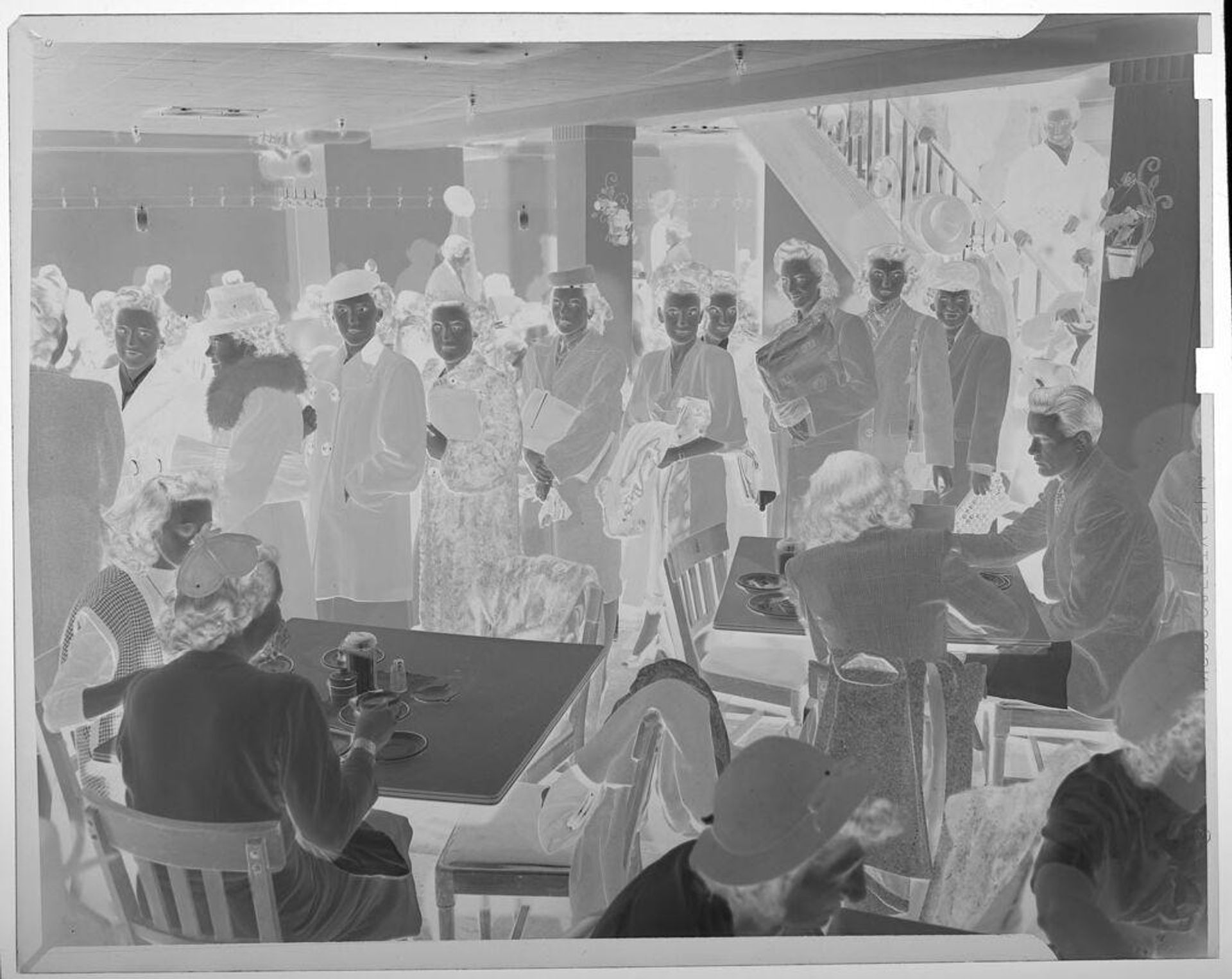 Untitled (long line of people waiting to order in restaurant) by Jack Gould
