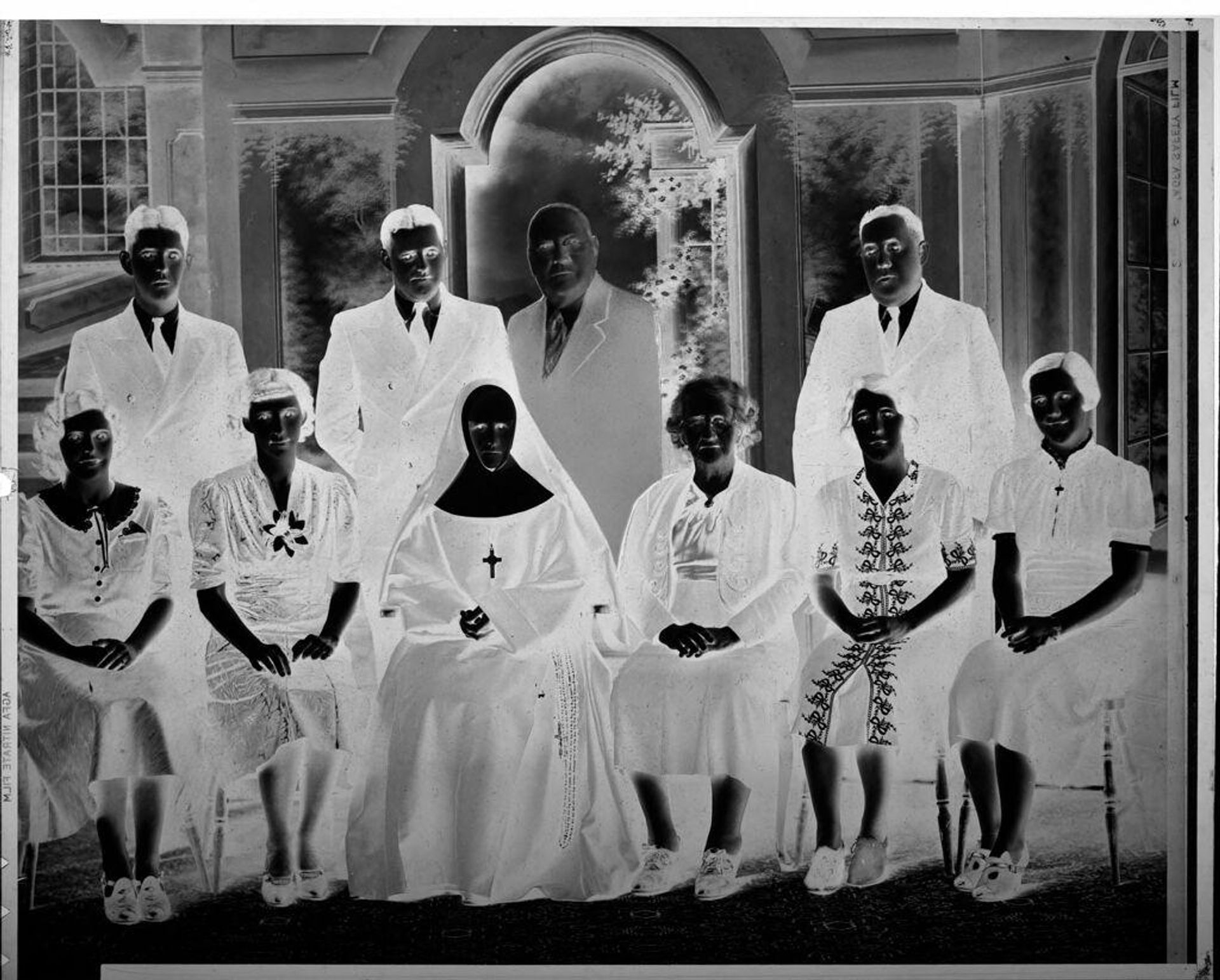 Untitled (group portrait including nun) by Durette Studio