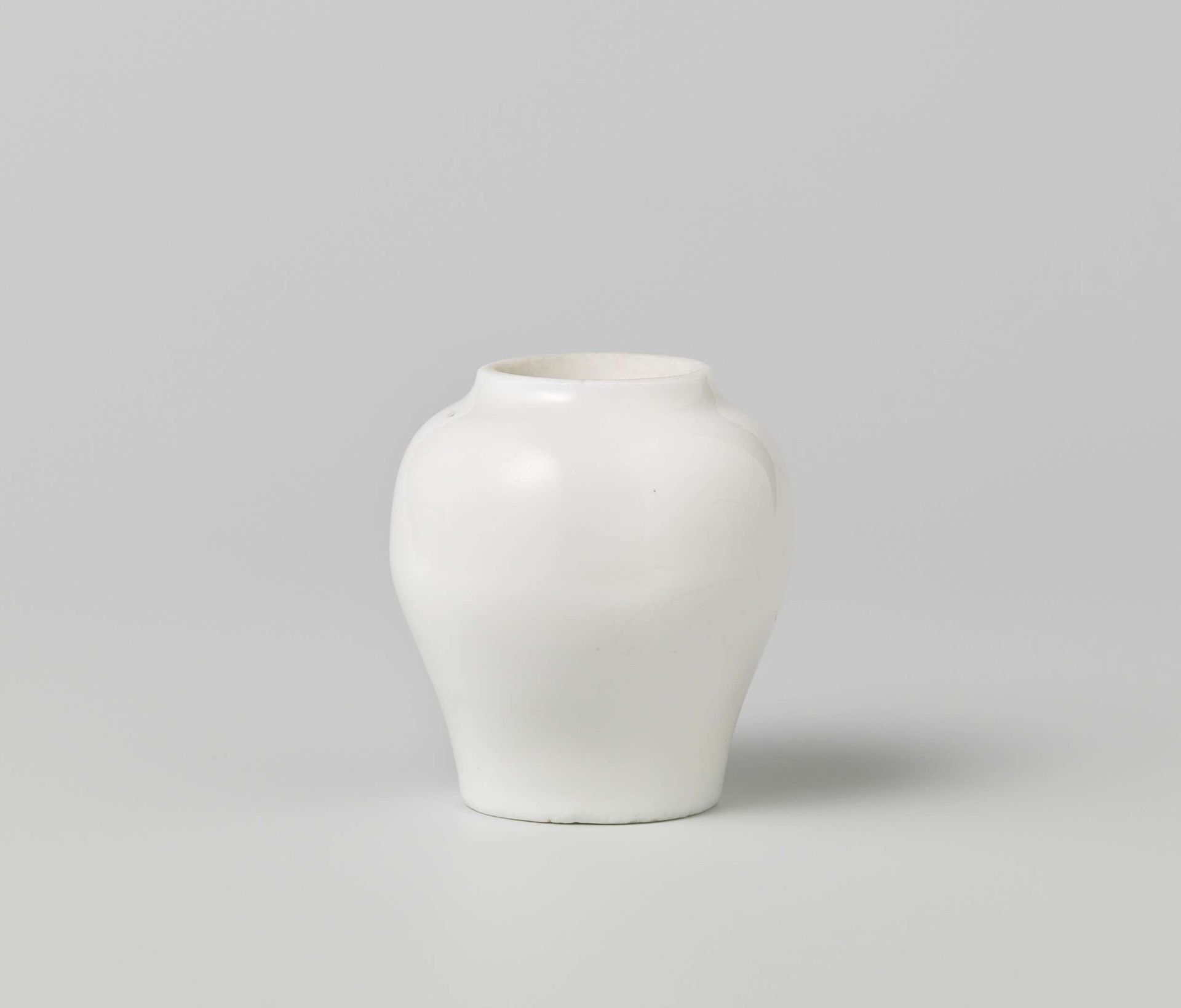 Small, baluster vase with lightly incised flower spray by Anonymous