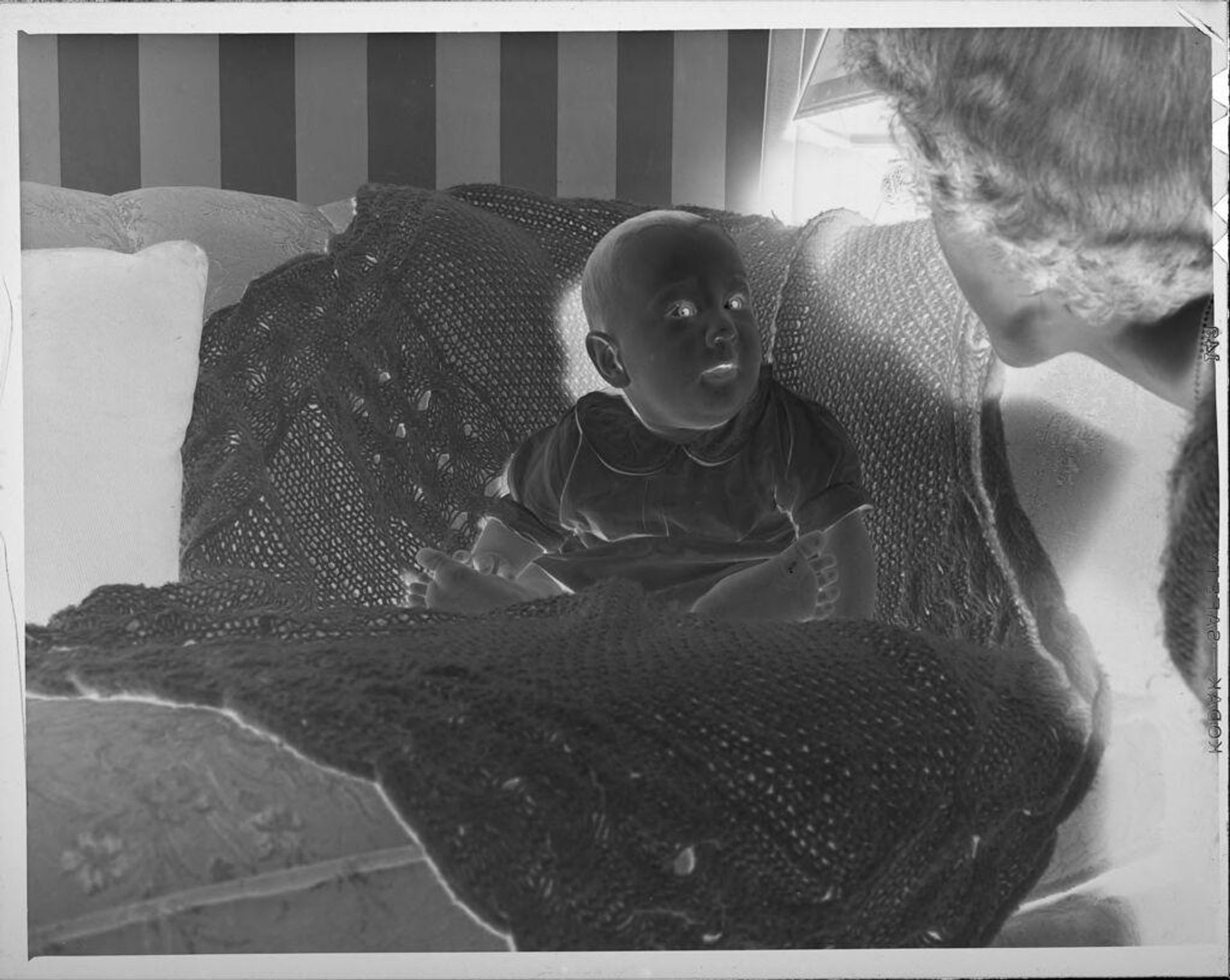 Untitled (baby on blanket) by Lucian and Mary Brown