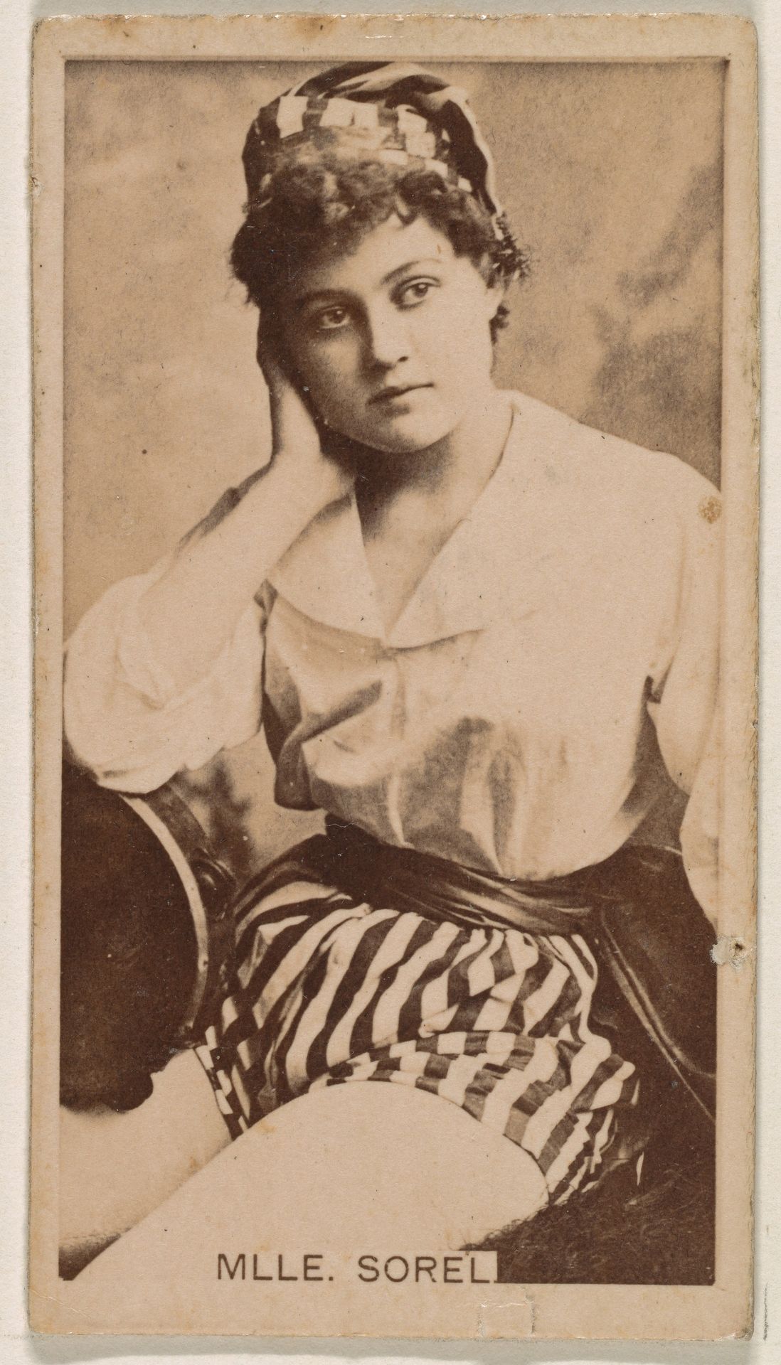Mlle. Sorel, from the Actresses series (N245) issued by Kinney Brothers to promote Sweet Caporal Cigarettes by Kinney Brothers Tobacco Company