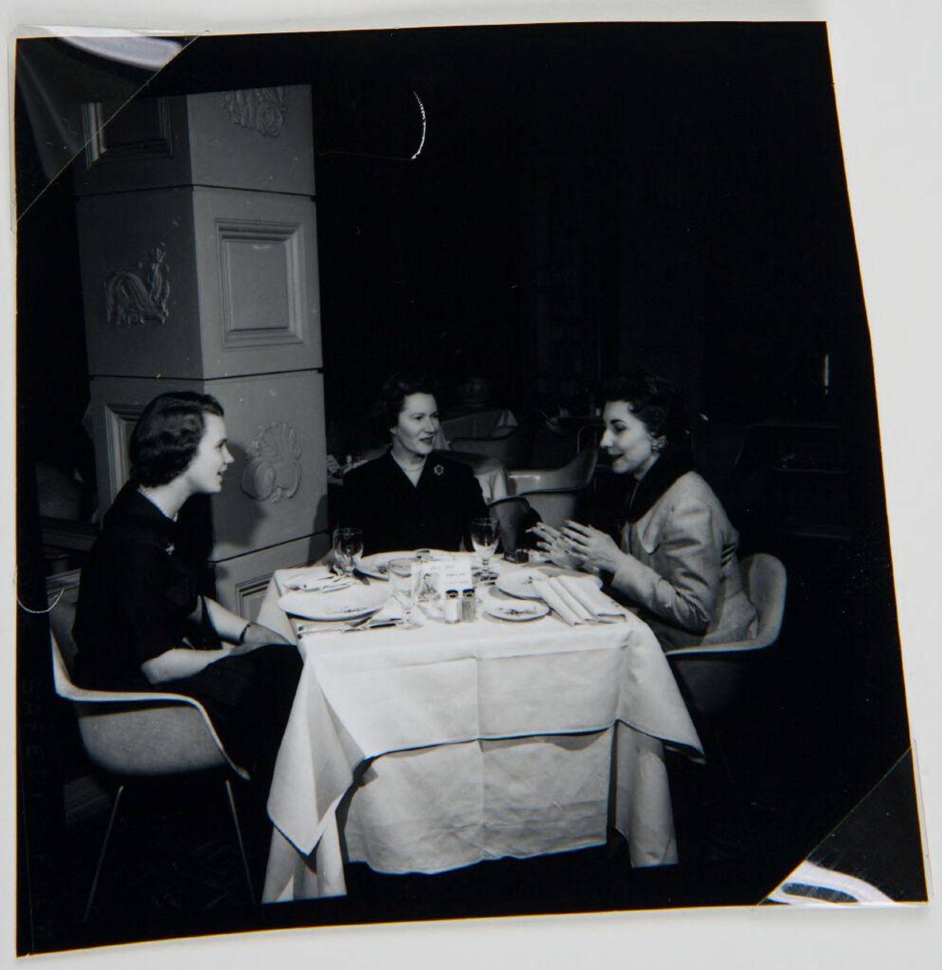 Untitled (three women sitting at table) by Jack Gould
