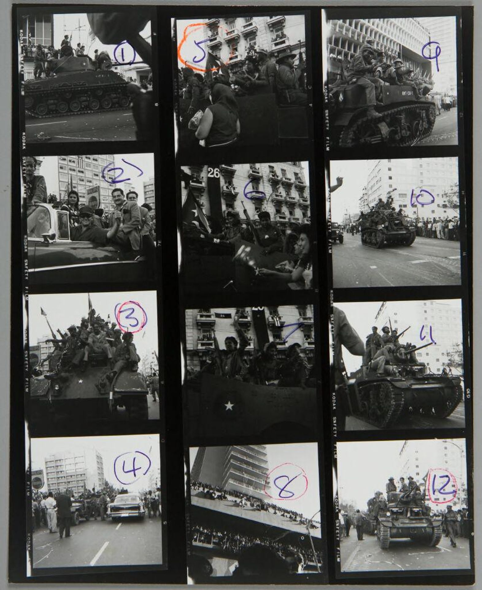 Untitled (twelve photographs: Cuban revolutionaries on tanks) by Lester Cole