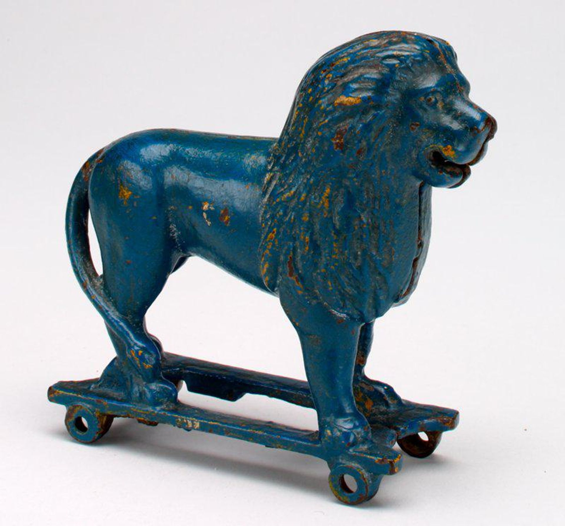 -Lion on Wheels- still bank by A.C. Williams Company