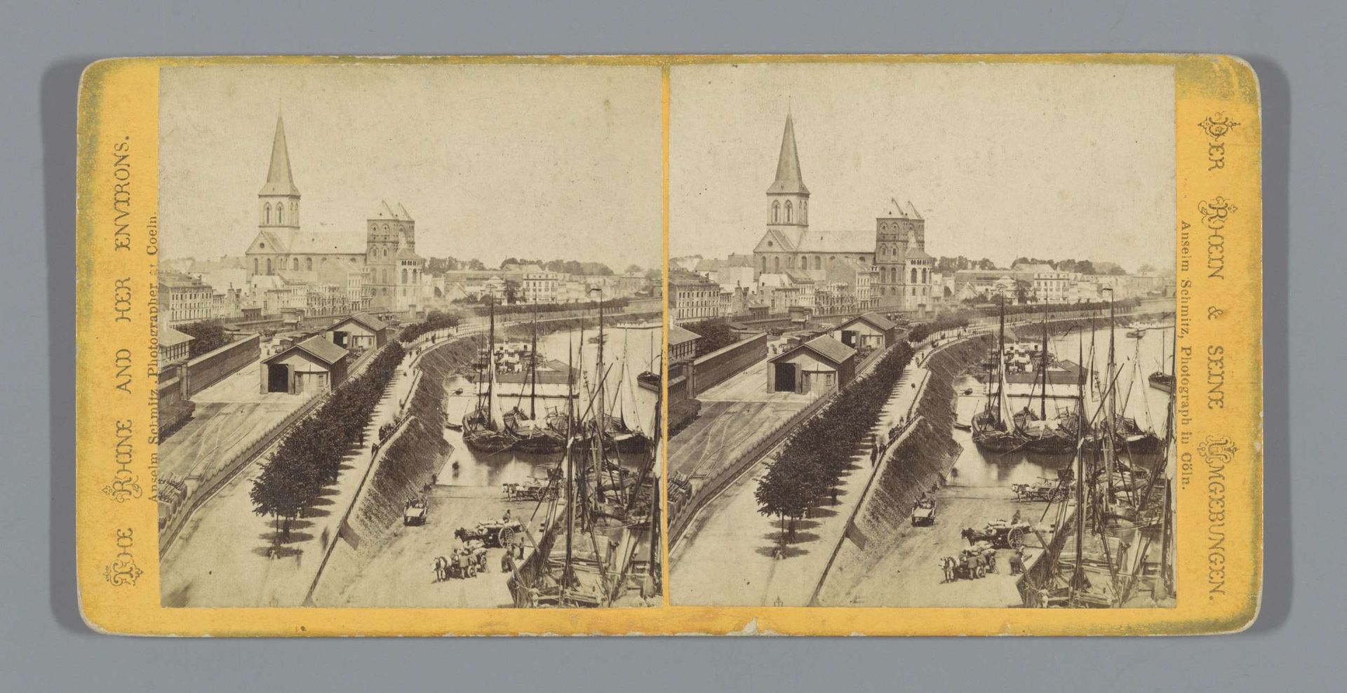 Gezicht op een kade te Keulen met op de achtergrond de Sint-Kunibertkerk by Anselm Schmitz