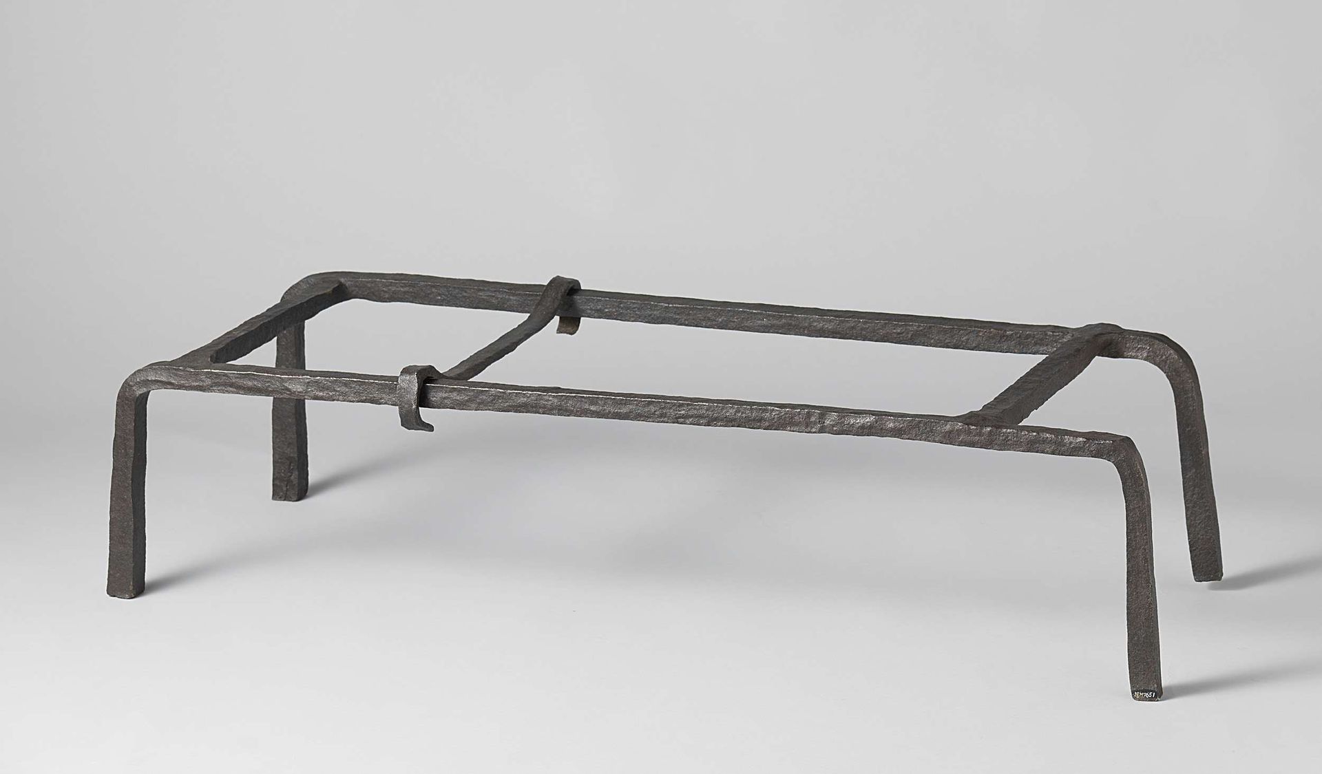 Andiron with cooking pots and a pair of fire tongs by Anonymous