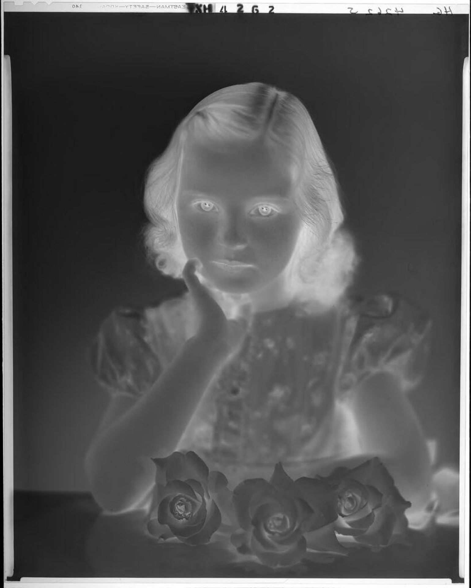 Untitled (portrait of young girl with three roses on table before her) by Paul Gittings