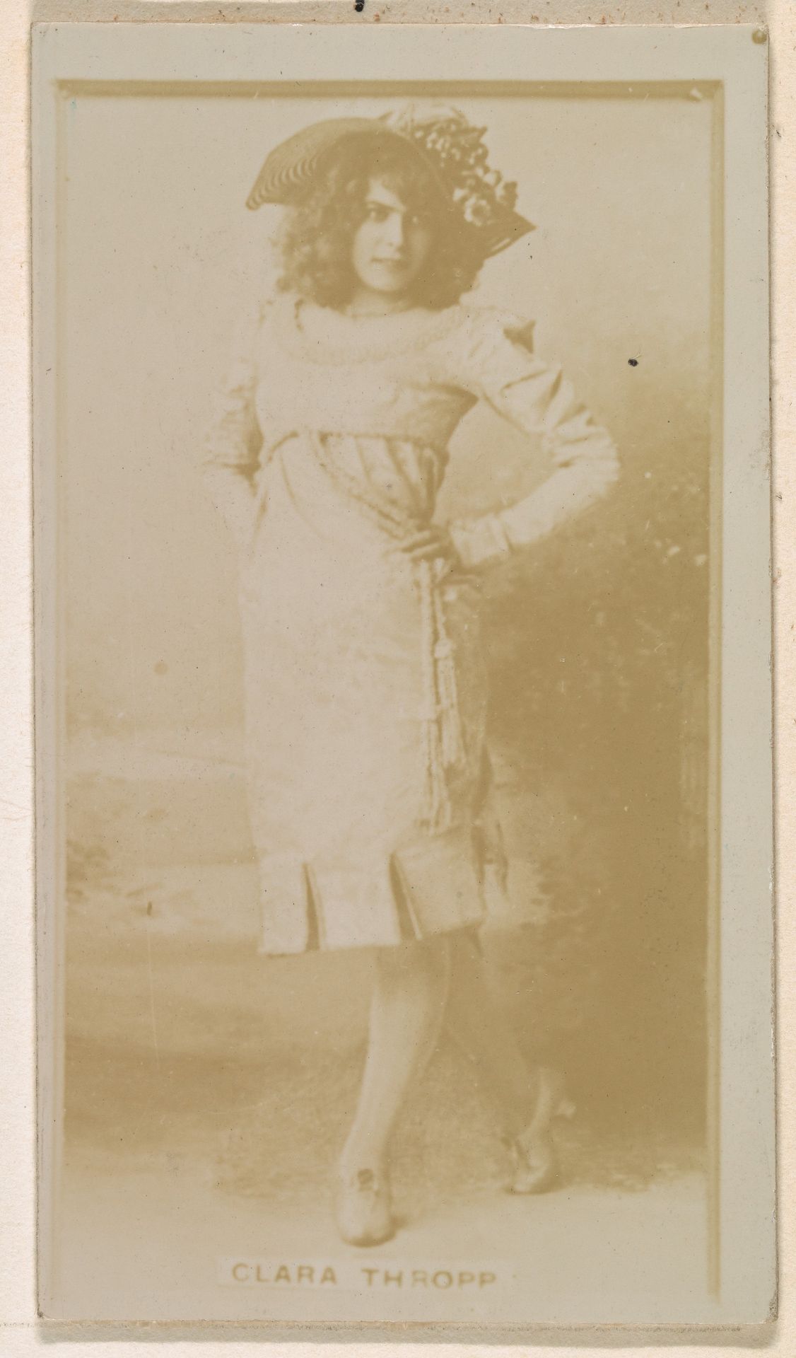 Clara Thropp, from the Actresses series (N245) issued by Kinney Brothers to promote Sweet Caporal Cigarettes by Kinney Brothers Tobacco Company