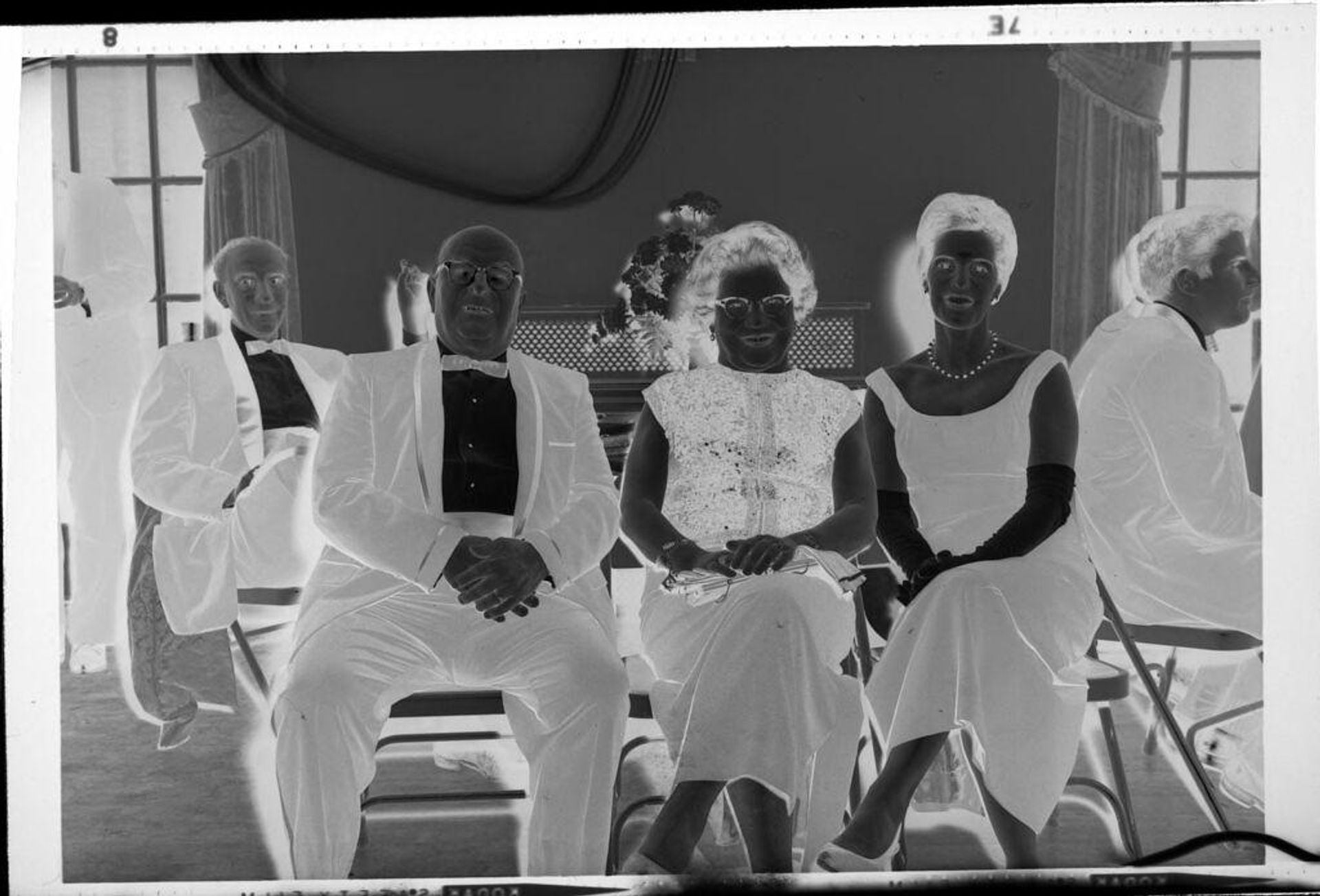 Untitled (guests at party, sitting) by Robert Burian