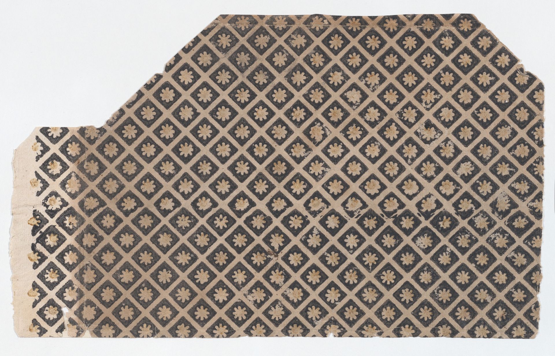 Sheet with overall pattern of flowers within squares by Anonymous