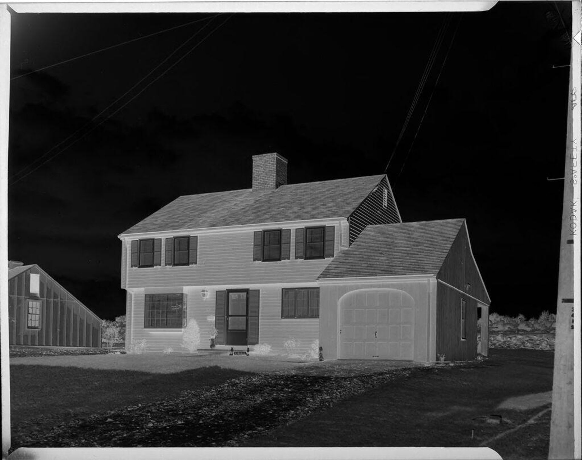 Untitled (exterior of house and garage) by Robert Burian