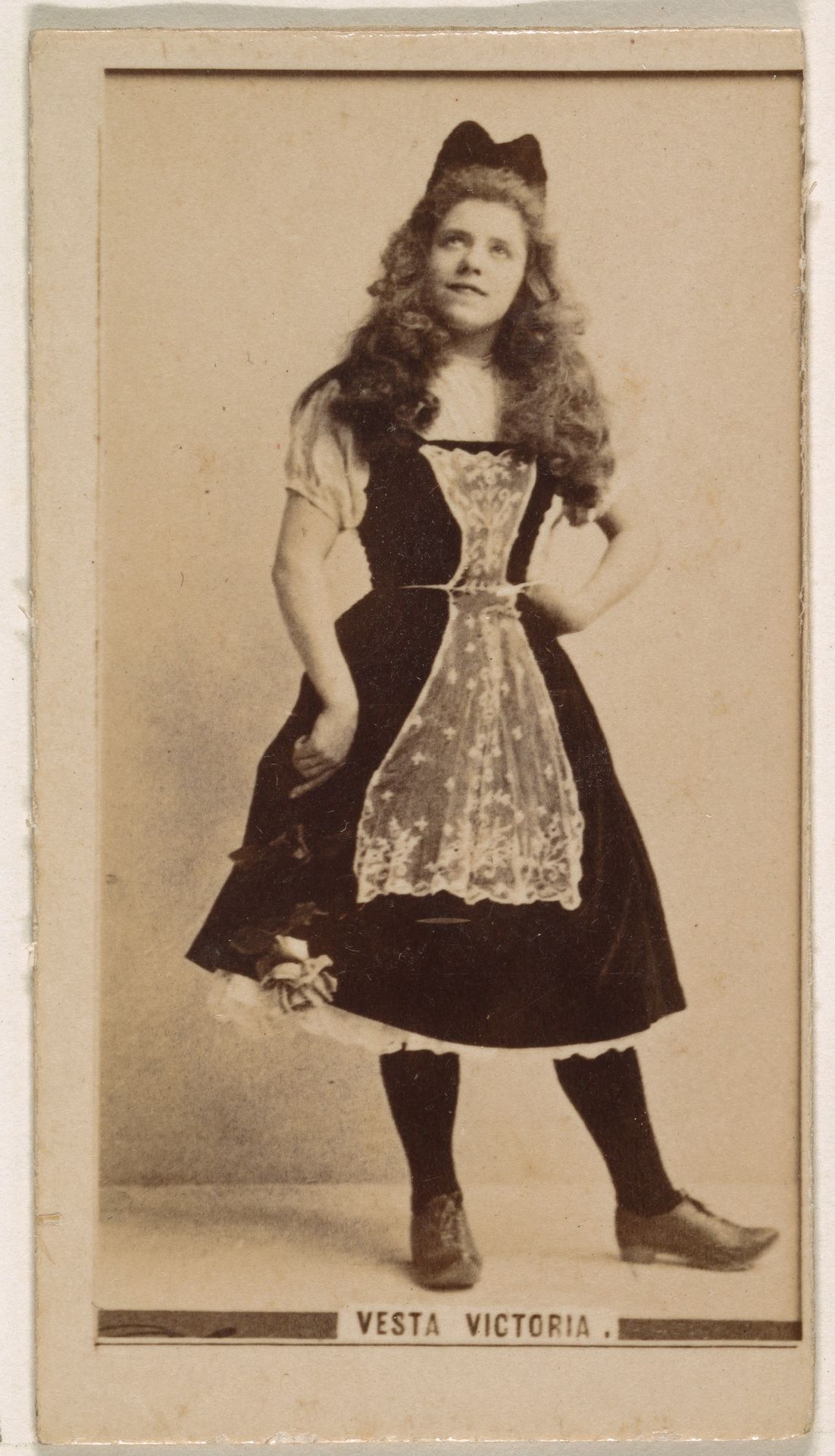 Vesta Victoria, from the Actresses series (N245) issued by Kinney Brothers to promote Sweet Caporal Cigarettes by Kinney Brothers Tobacco Company