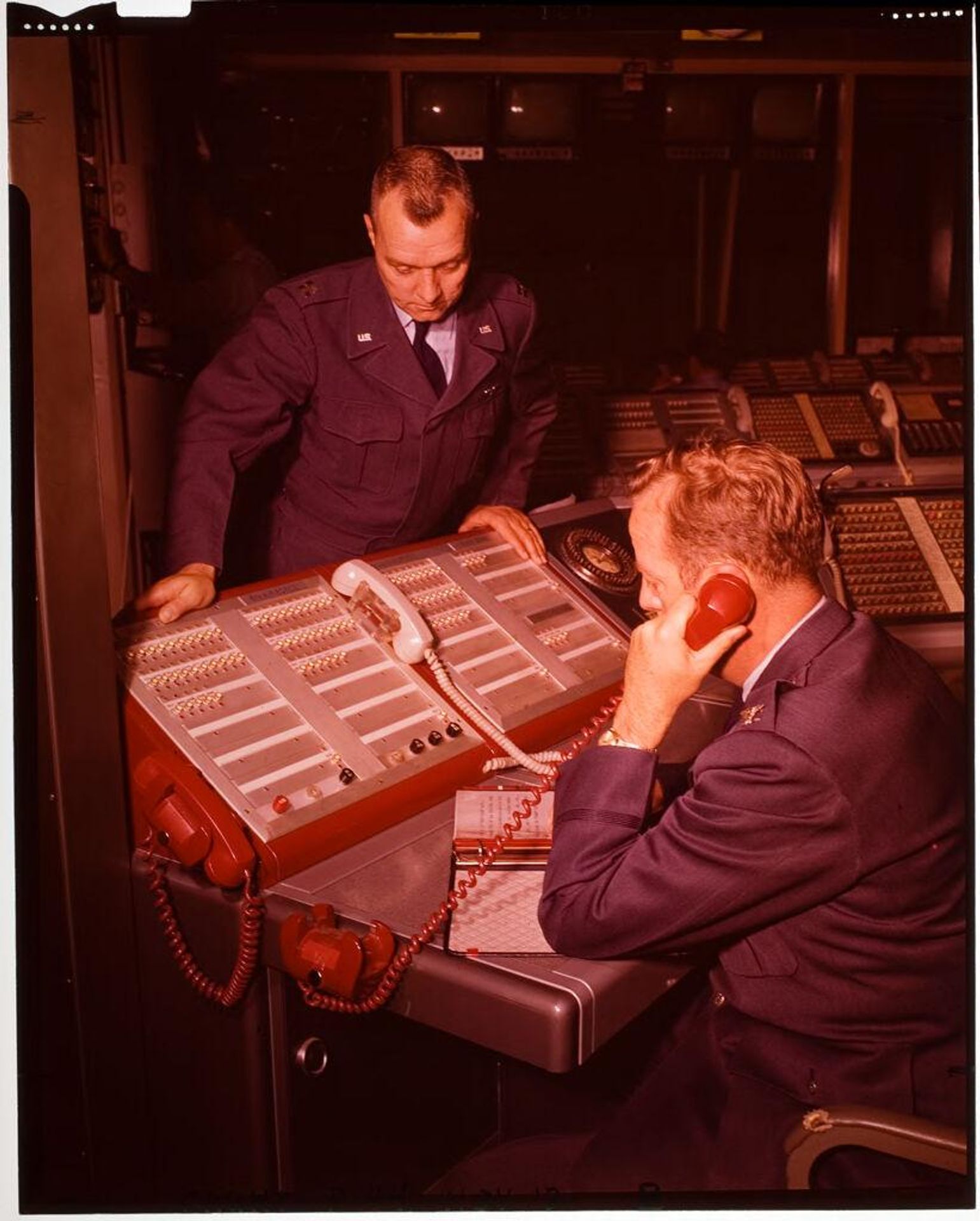 Untitled (men with military telephone) by Jack Gould