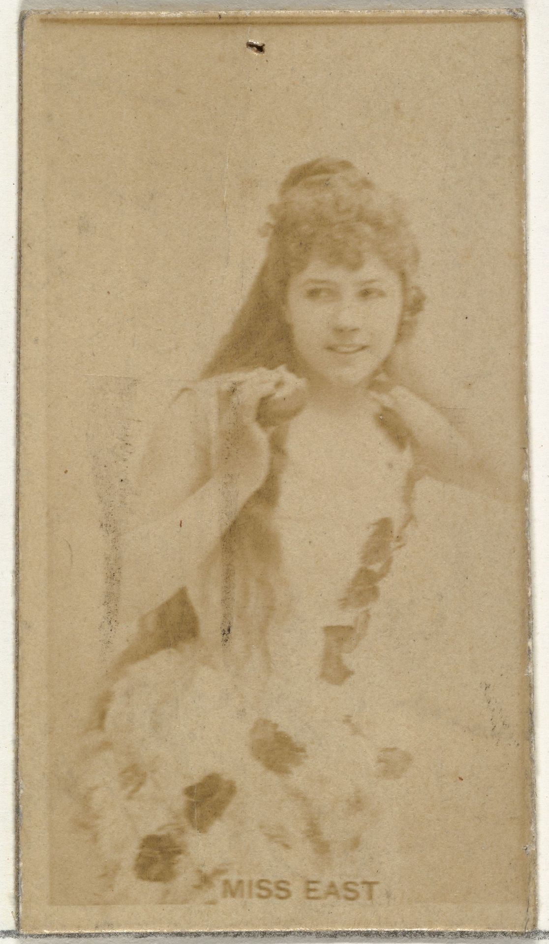 Miss East, from the Actors and Actresses series (N145-8) issued by Duke Sons & Co. to promote Duke Cigarettes by W. Duke, Sons & Co.
