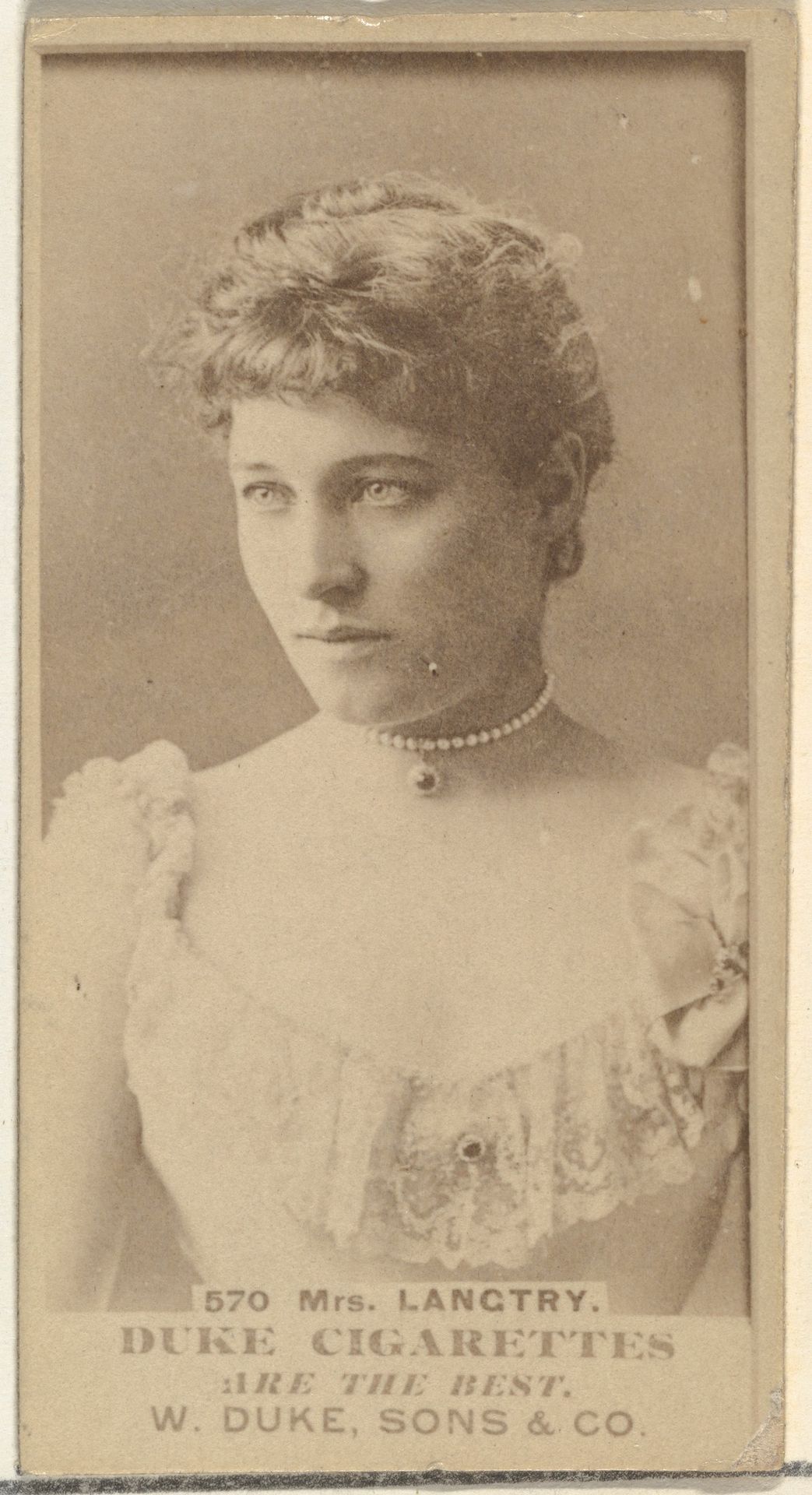 Card Number 570, Mrs. Langtry, from the Actors and Actresses series (N145-7) issued by Duke Sons & Co. to promote Duke Cigarettes by W. Duke, Sons & Co.