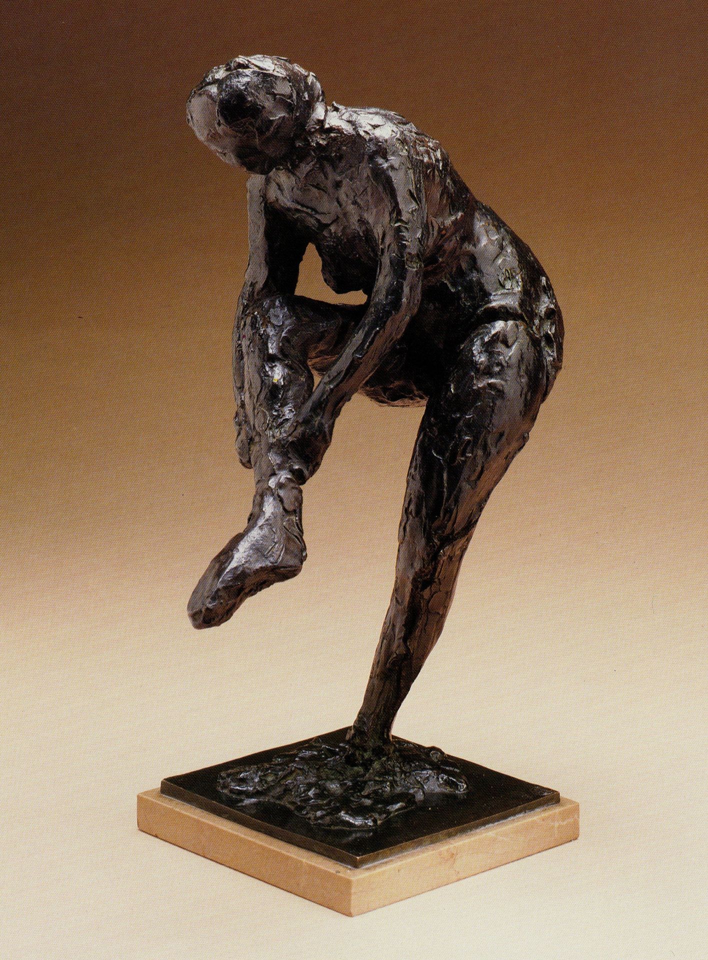 Woman Putting on a Stocking by Edgar Degas