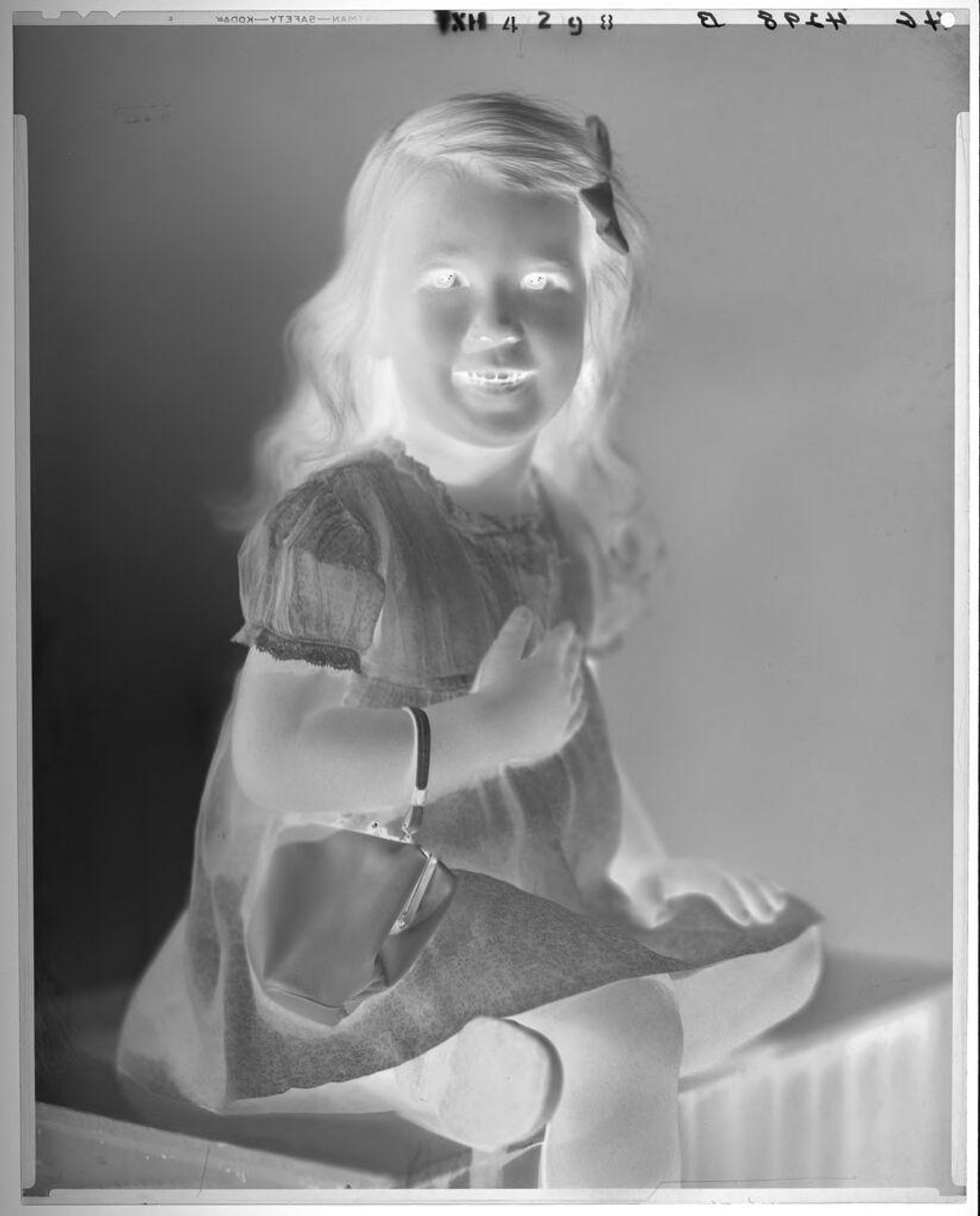 Untitled (portrait of little girl carrying purse over her arm) by Paul Gittings