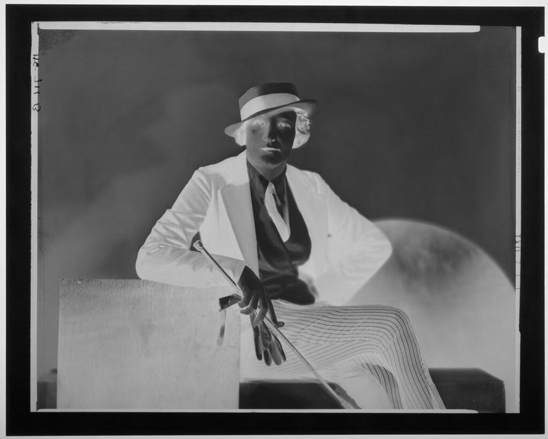 Untitled (portrait of woman seated in riding clothes) by Paul Gittings