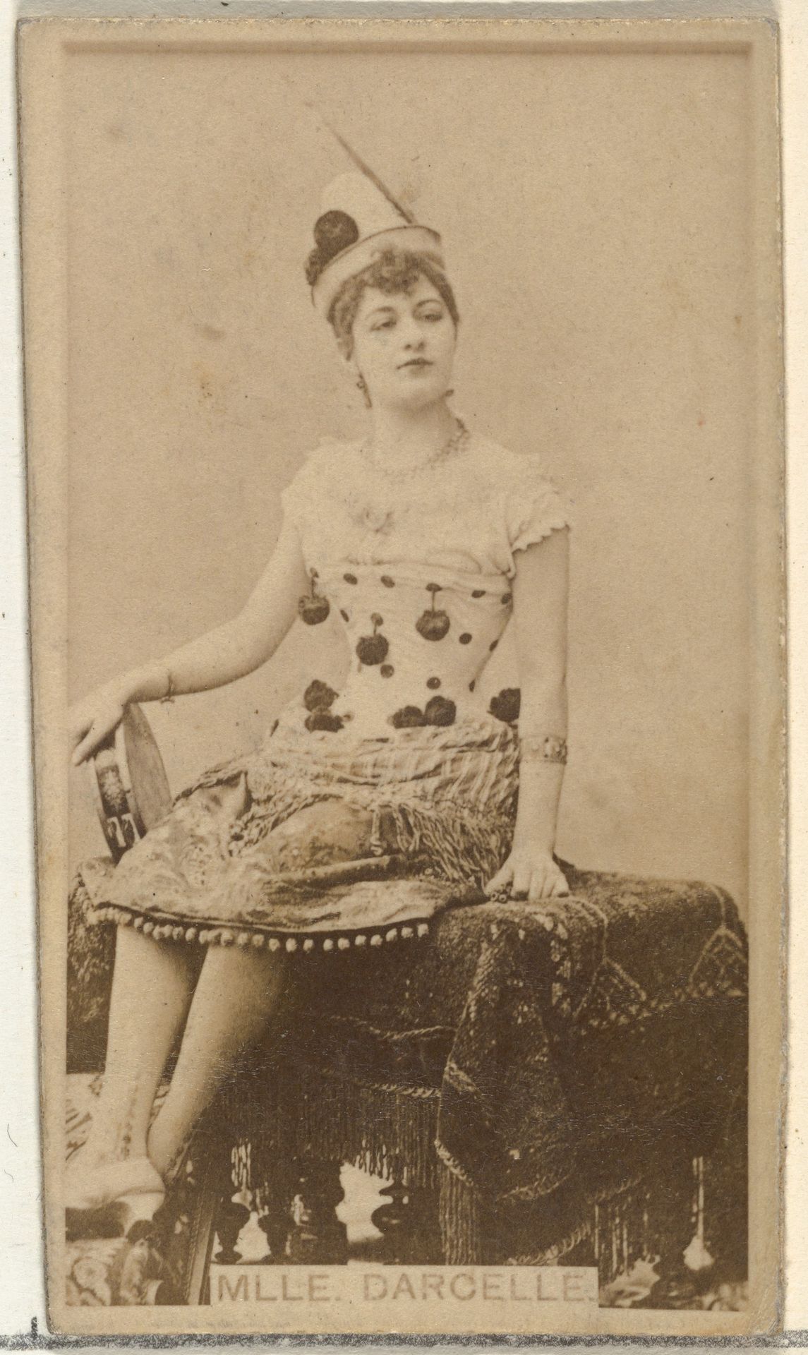 Mlle. Darcelle, from the Actors and Actresses series (N145-8) issued by Duke Sons & Co. to promote Duke Cigarettes by W. Duke, Sons & Co.