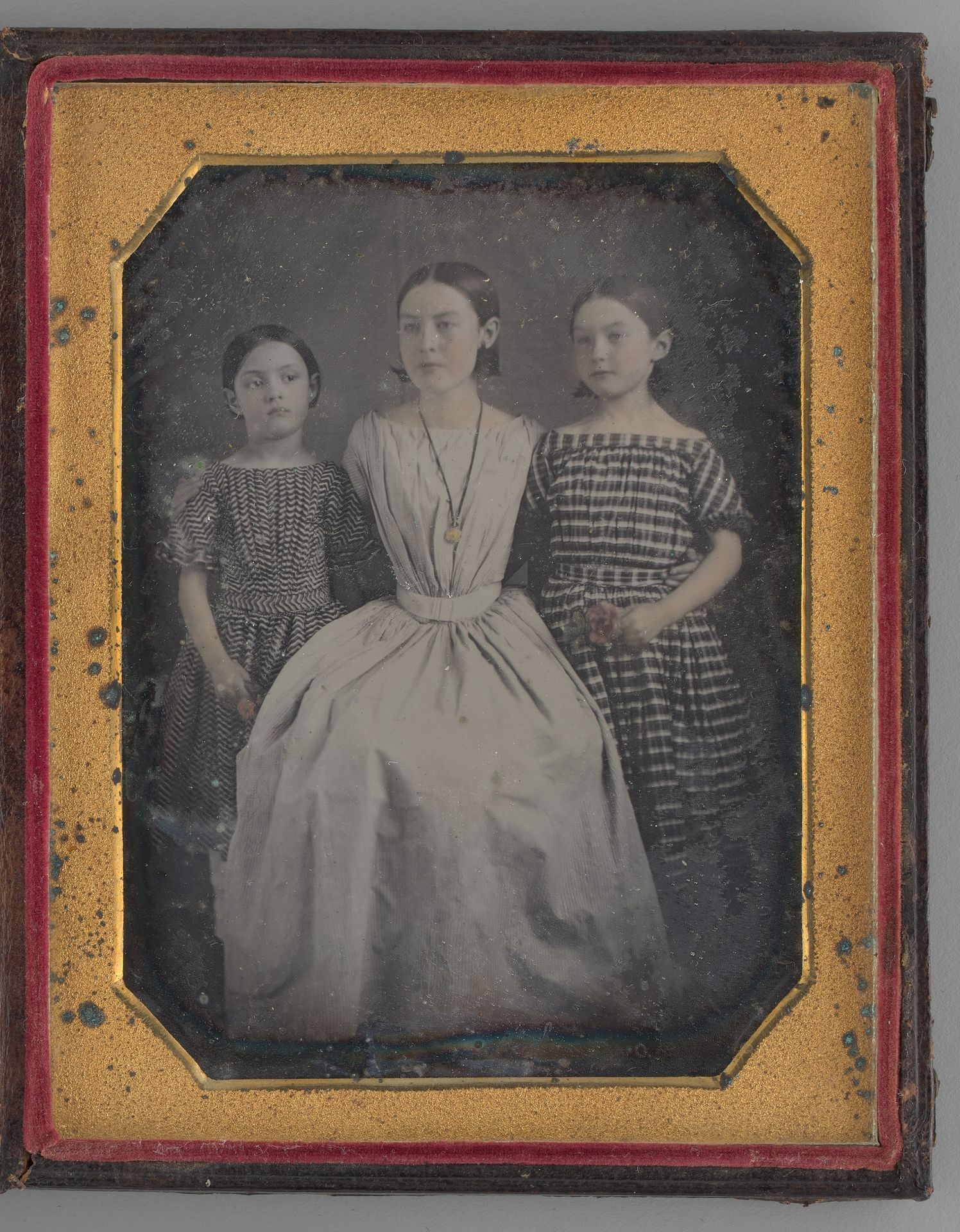 Untitled (Portrait of a Woman with Two Girls) by Anonymous