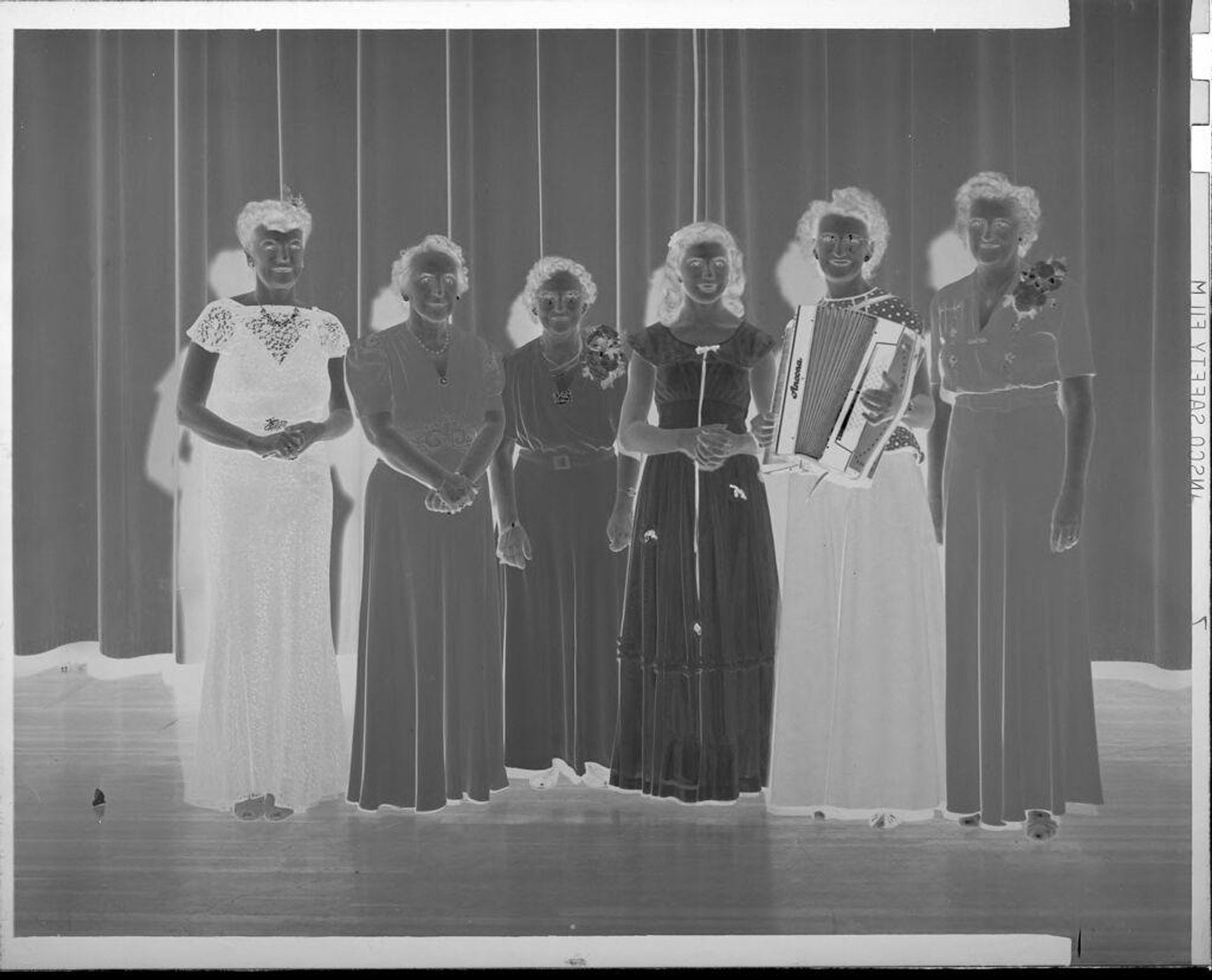 Untitled (women wearing dresses, onstage) by Robert Burian